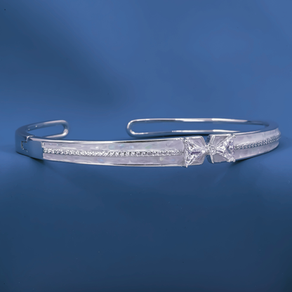 Radiant Bow-Twist Bangle – Sterling Silver Cuff Bracelet